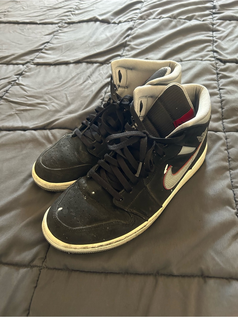 Nike Jordan Men’s Black and White High-Top Sneakers